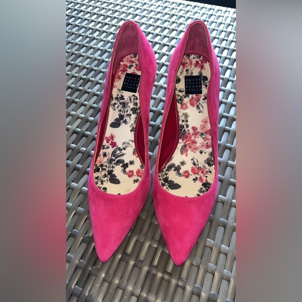 This is a pair of White House Black Market Lana Pink Thrill suede pumps.